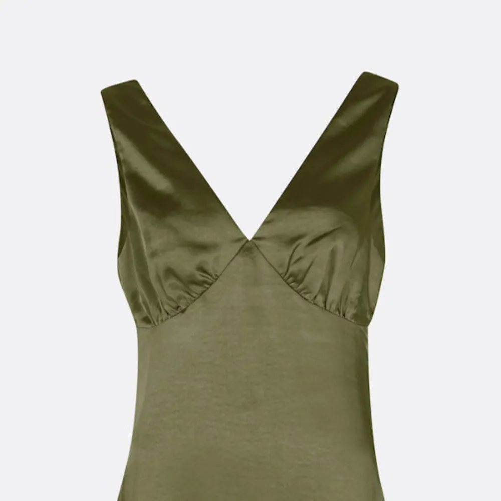 Grön klänning från bikbok som va populär förra sömmaren💚💚. Klänningar.