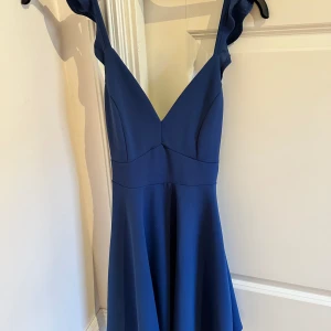 Fin klänning  - Jättebra skick, det står inte storlek men skulle säga S och passar XS