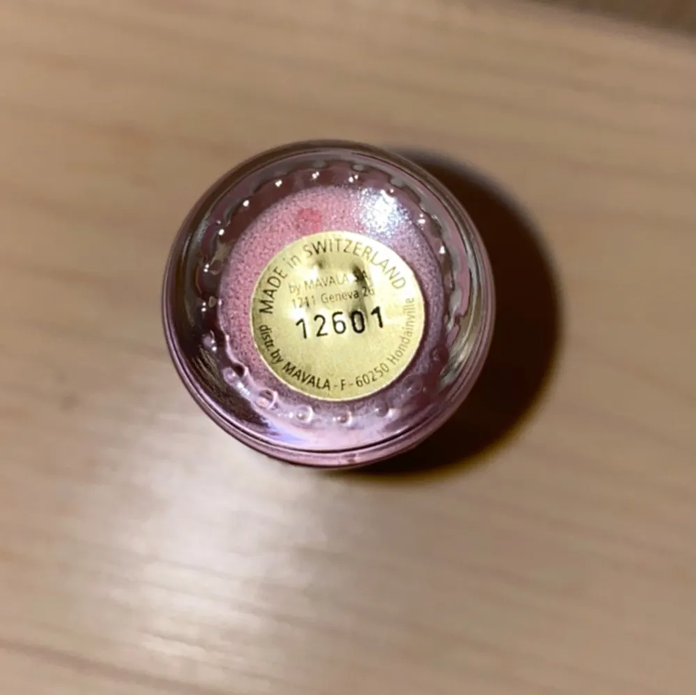 Ett rosa nagellack i färgen 316 Fiji.. Övrigt.