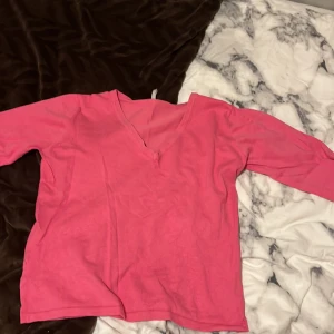 Rosa V ringad långärmad  - Bra skick, storlek 40