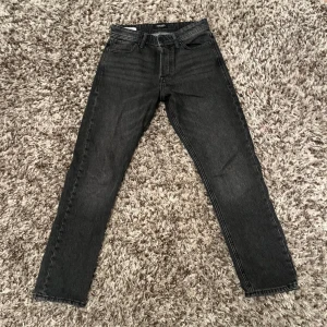 Jeans Jack&Jones - Snygga svarta jeans, loose chris ej använda så mycket skick 9/10