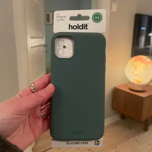 Iphoneskal i originalförpackning från Holdit. Passar IPhone 11 och IPhone XR.