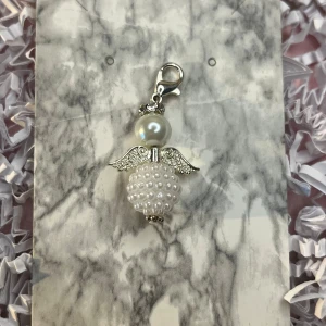 Vit och silver lyckoängel - Vit och silver lyckoängel.