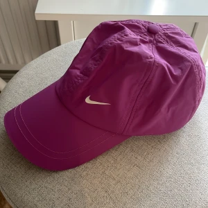 Nike cap - Used but in good condition  Purple cap