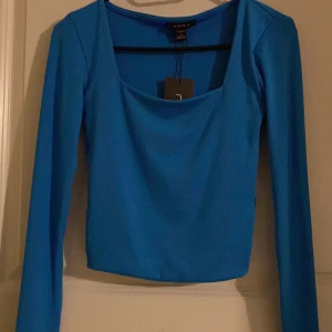 Snygg topp  - Helt ny, aldrig använd 