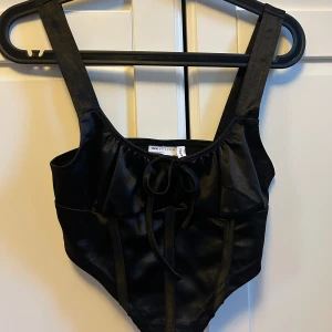 Fest-topp - Fest topp med korsett passform. Använd 1 gång