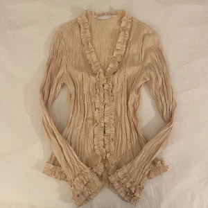 vintage blus - aprikosfärgad blus med korsettknäppning