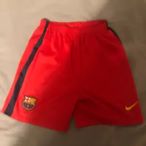 Röda Barcelona shorts 