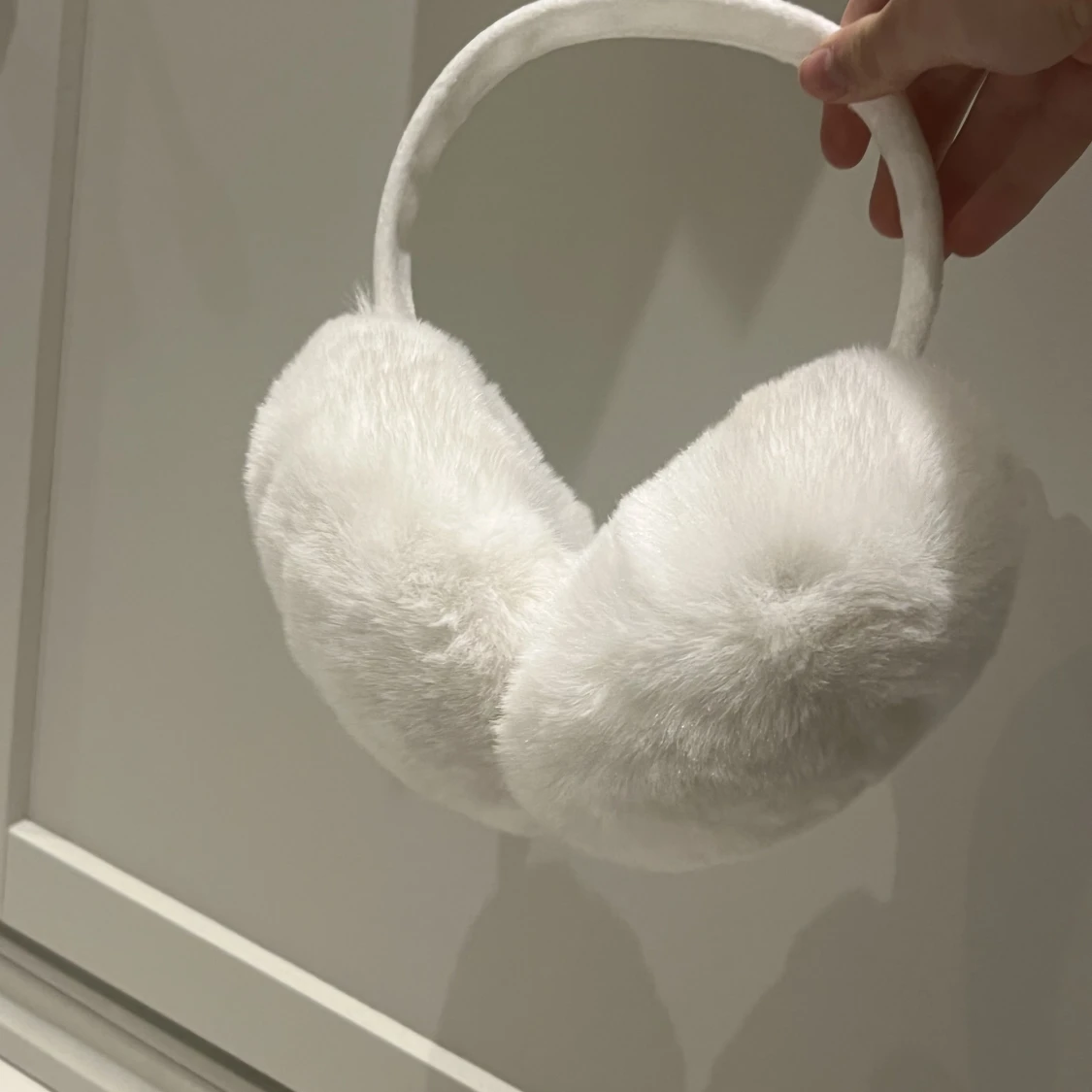 Vita öronmuffar  - 90