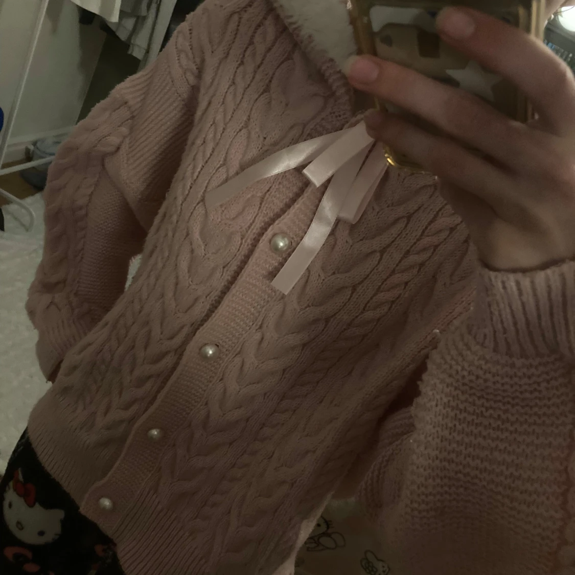 Rosa stickad kofta med rosett - 1