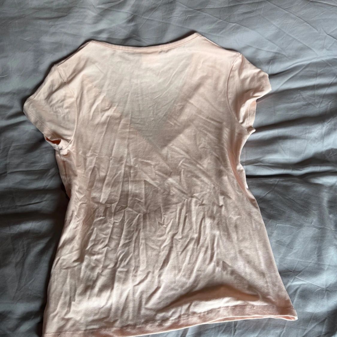 Ljusrosa omlottopp från Nelly - 2