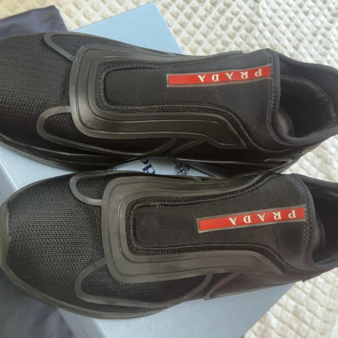 Svarta sneakers från Prada - 1