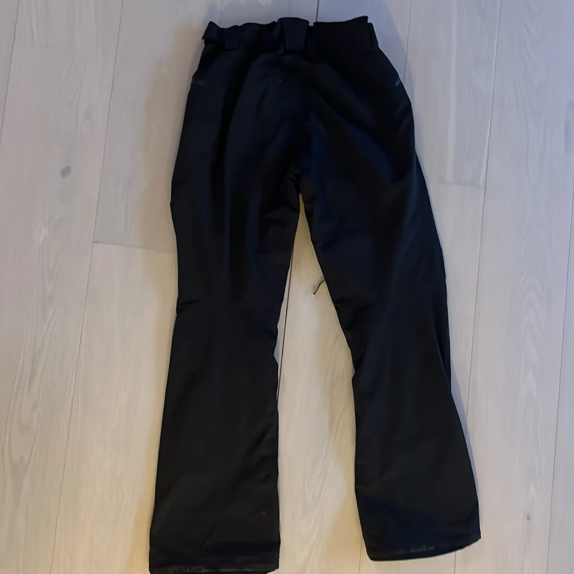 Svarta täckbyxor från Salomon - 1