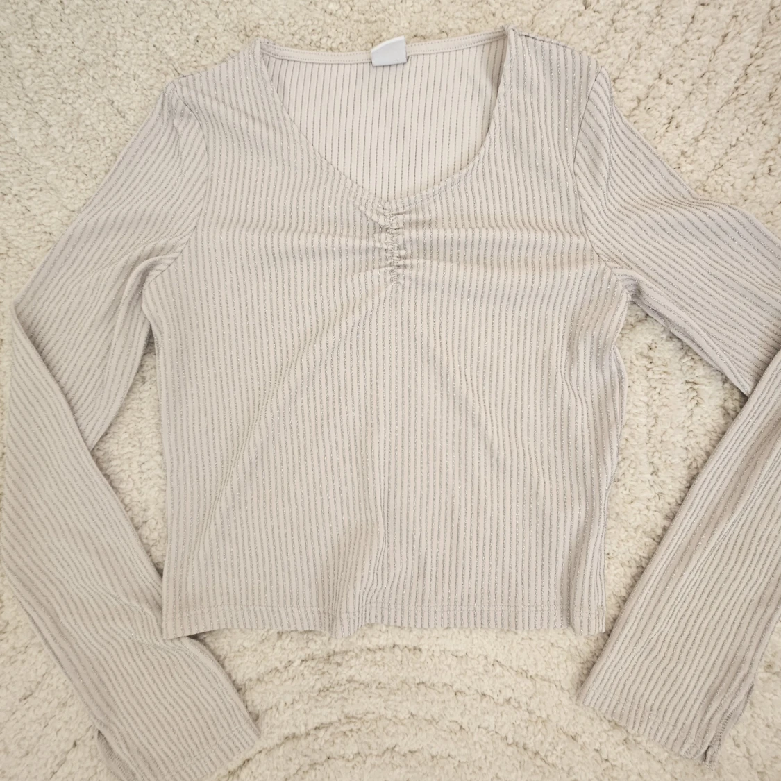 Glittrig ribbad topp från Lindex