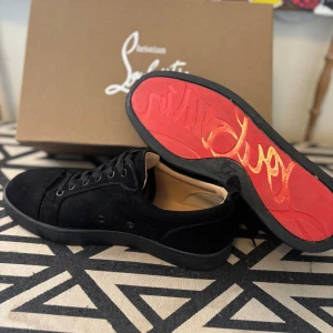 Svarta Louboutins - storlek 40