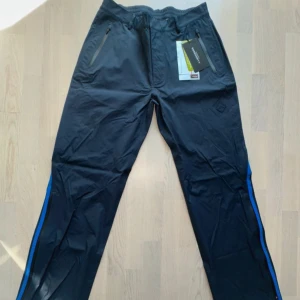 J.lindeberg regn byxor herr - Nya J.lindeberg regn byxor 