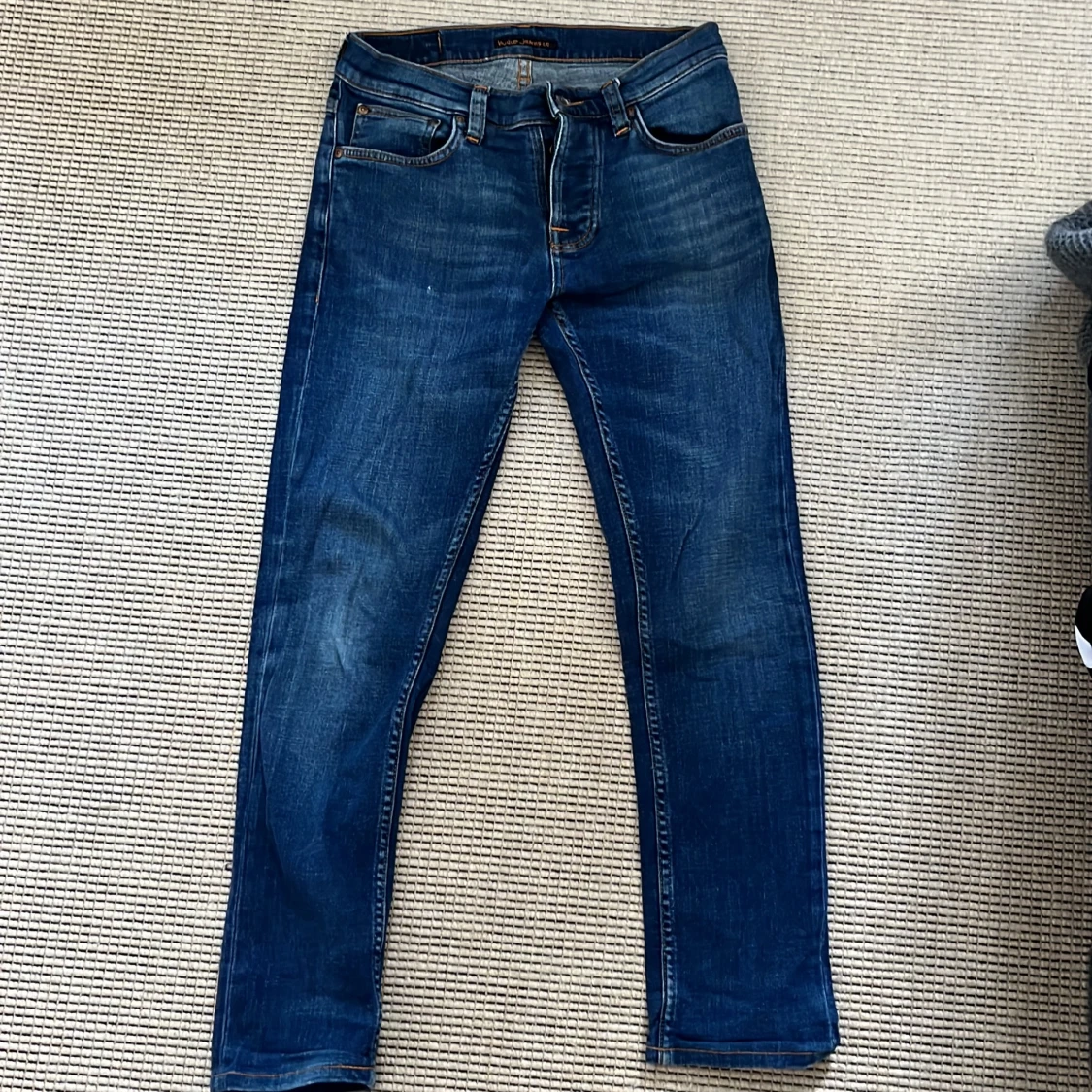 Blå jeans från Nudie Jeans Grim Tim 28W 32L - 1