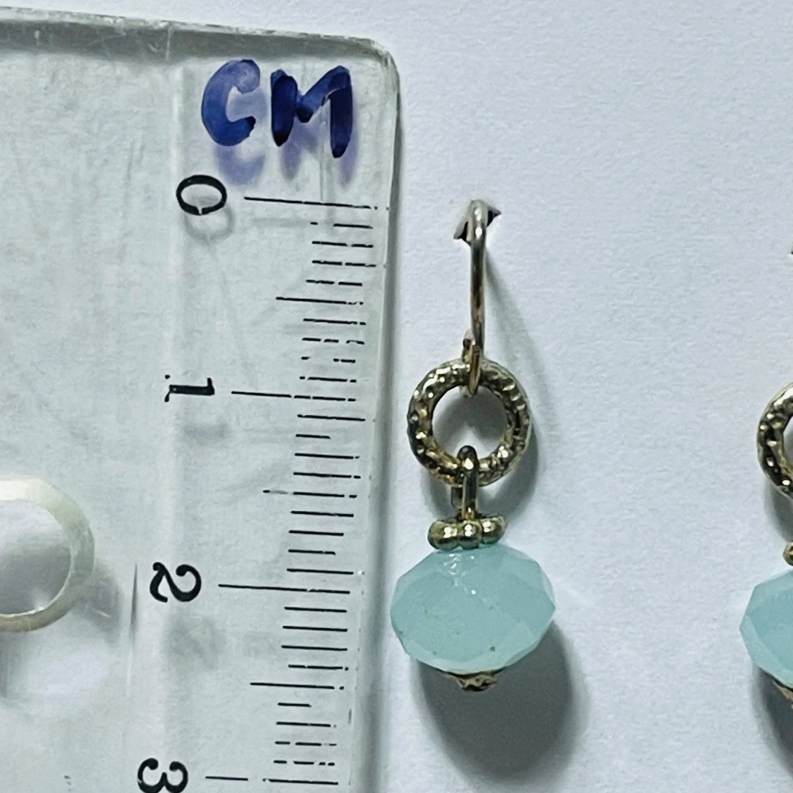 Earrings with light blue faceted glass beads - 1