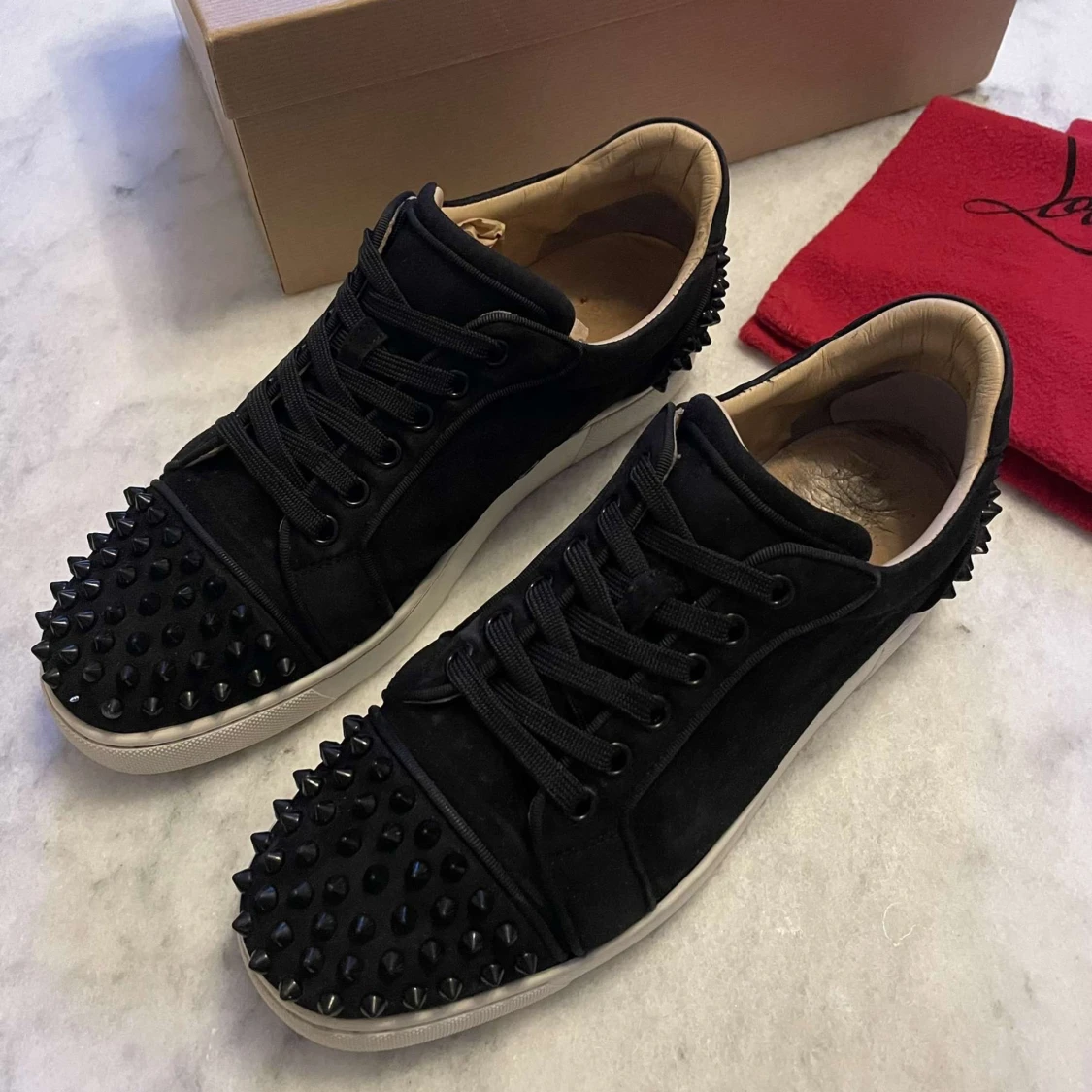 Christian Louboutin  - 1