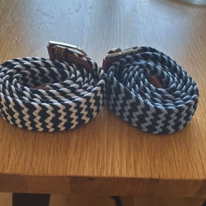 Två flätade bälten med zigzag-mönster - Säljer 2 flätade bälten har aldrig använts 