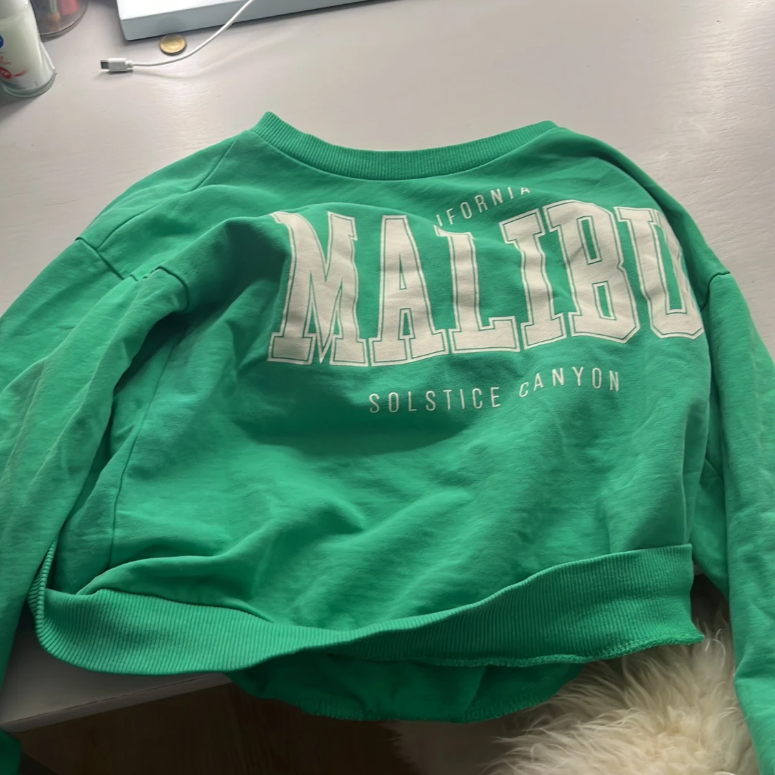 Grön sweatshirt med tryck från Kappahl