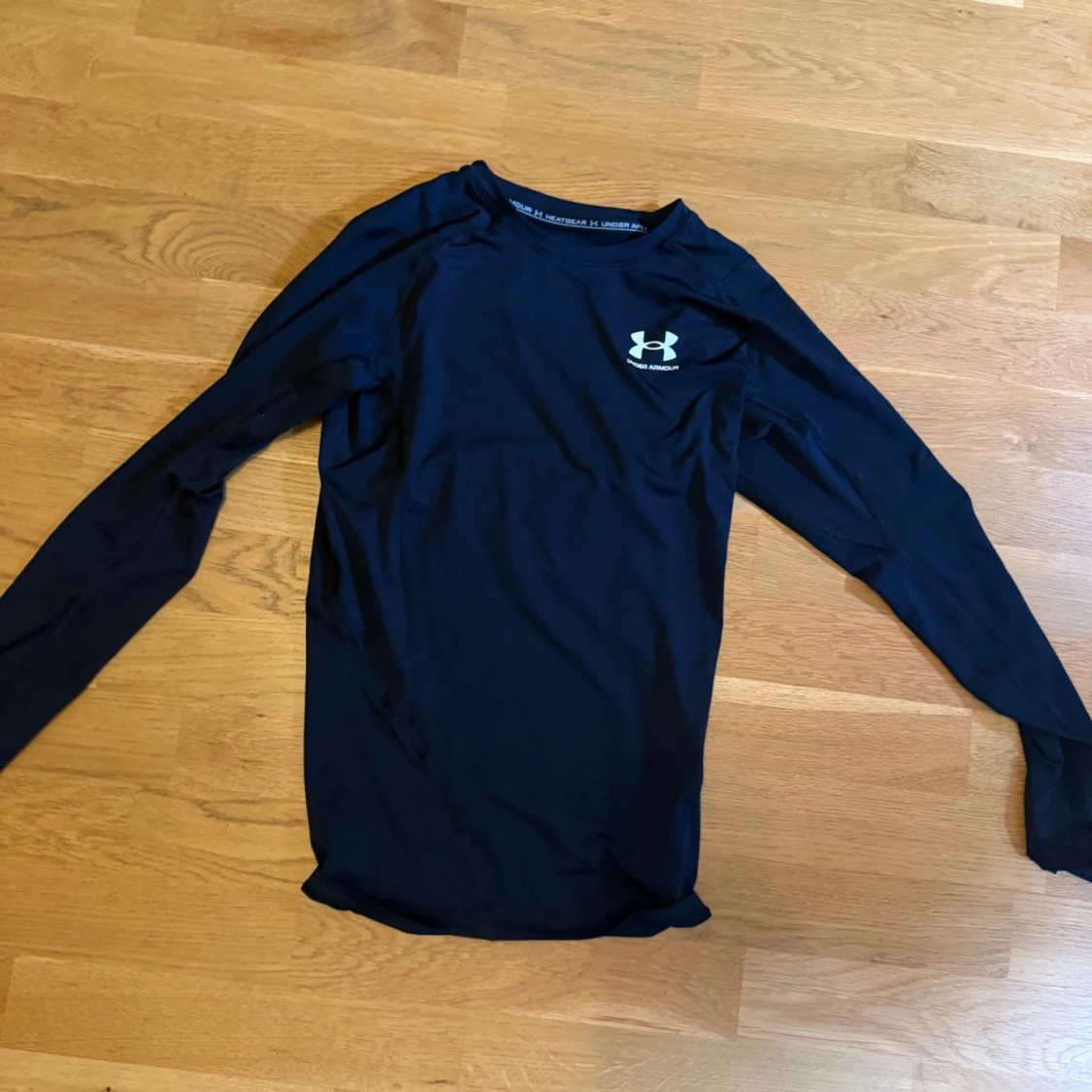 Svart långärmad träningströja Under Armour