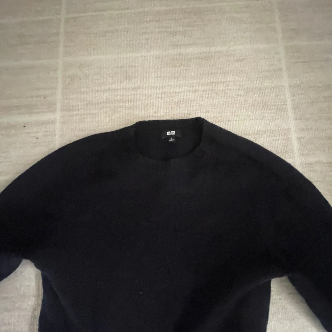 Svart stickad tröja från Uniqlo