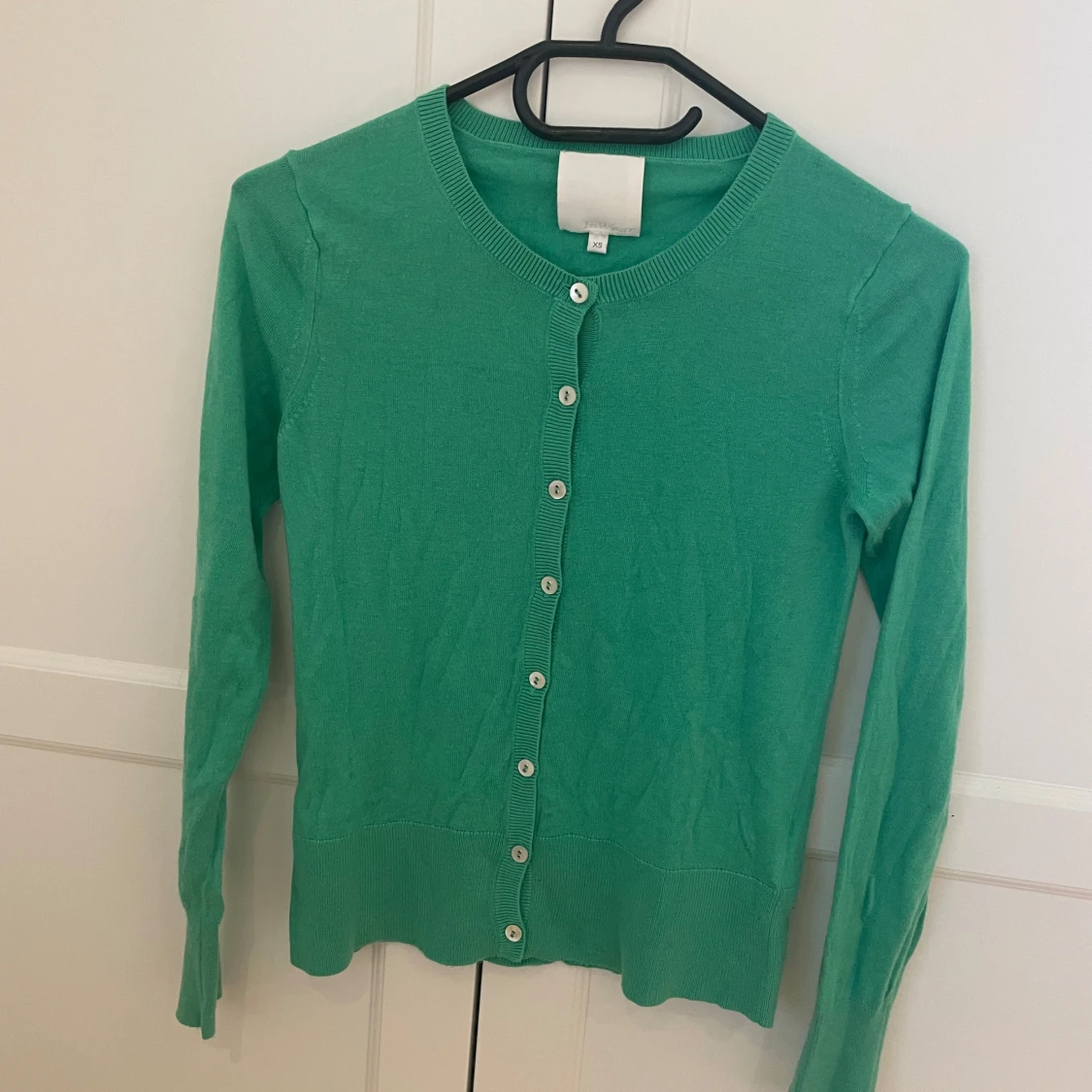 Grön kofta med knappar - 1