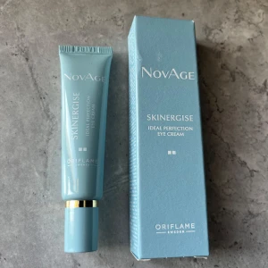 NovAge ögonkräm från Oriflame - NovAge Skinergise Ideal Perfection Eye Cream från Oriflame i en stilren ljusblå tub med gulddetalj. Kommer i originalförpackning.