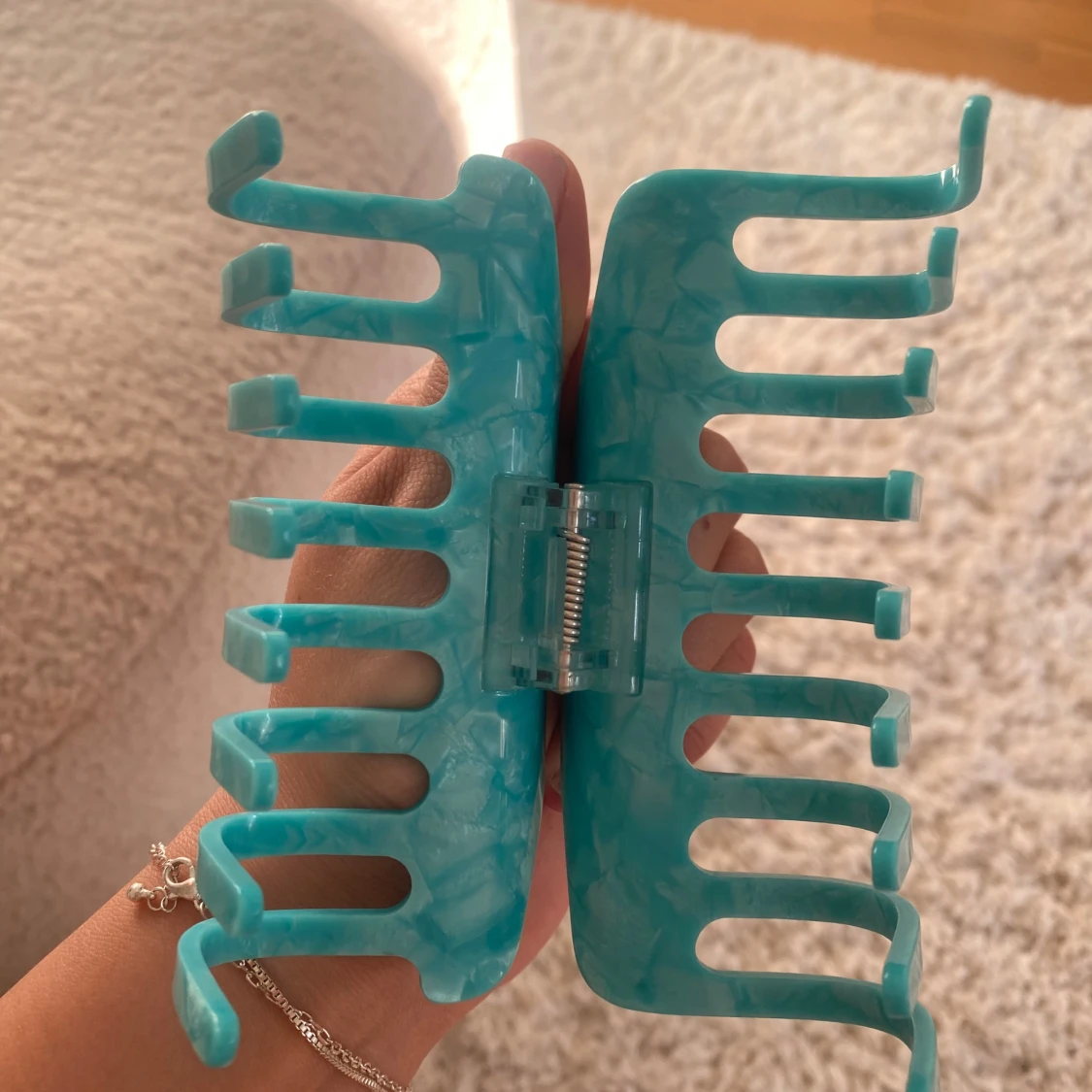 Turkos hårklämma från Lululemon - 2