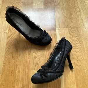 coquette heels - only worn once, the inner soles were flaky when i got them, there is a small mark on one of the shoes (see photo) 