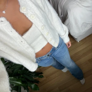 Stickat set - Säljer detta stickade set från Stradivarius. Både linnet och koftan ingår