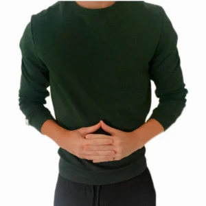 Grön Crewneck - Riktigt fin mörkgrön crewneck, slimfit passform, storlek S, så gott som nytt skick.