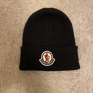 Moncl4r black beanie - New black beanie. Without price tags.