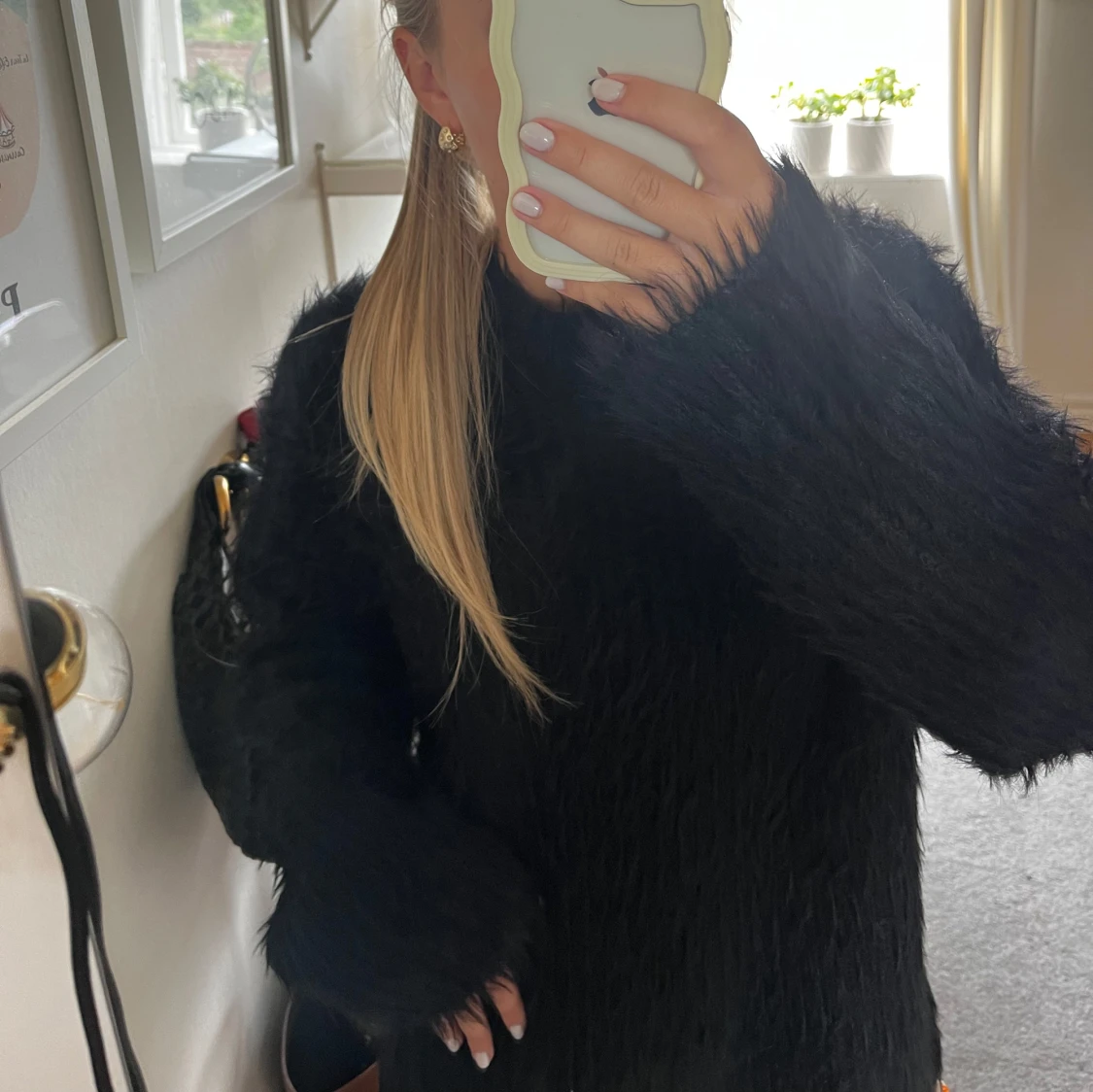 Svart stickad tröja