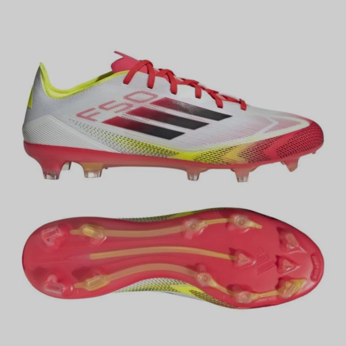 Adidas fotbollsskor i rött och vitt