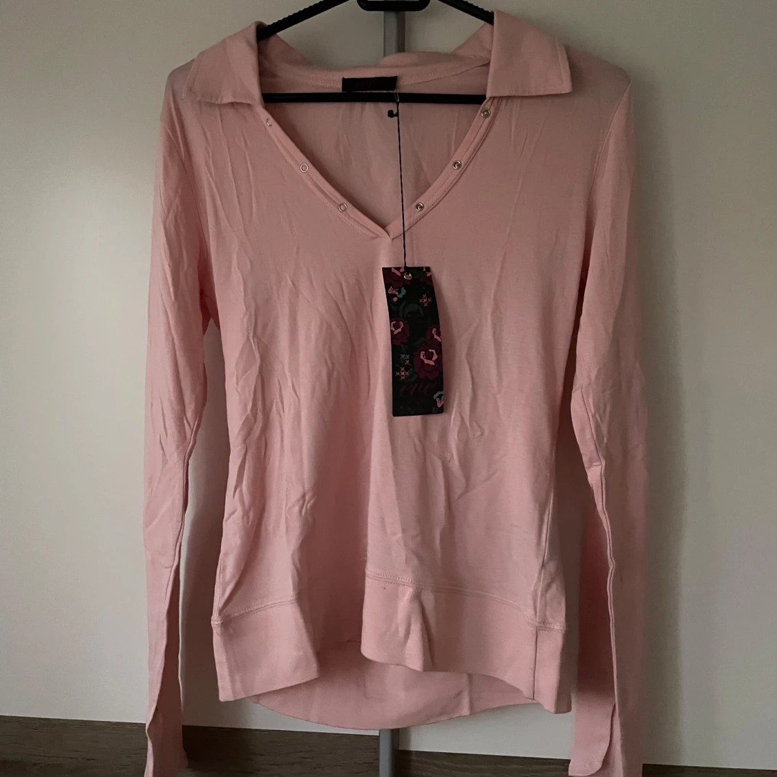 Ljusrosa långärmad pikétröja - 1