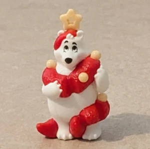 Björn av plast som är ihop byggd - Björn med julkänsla av plast som är ihop byggd.