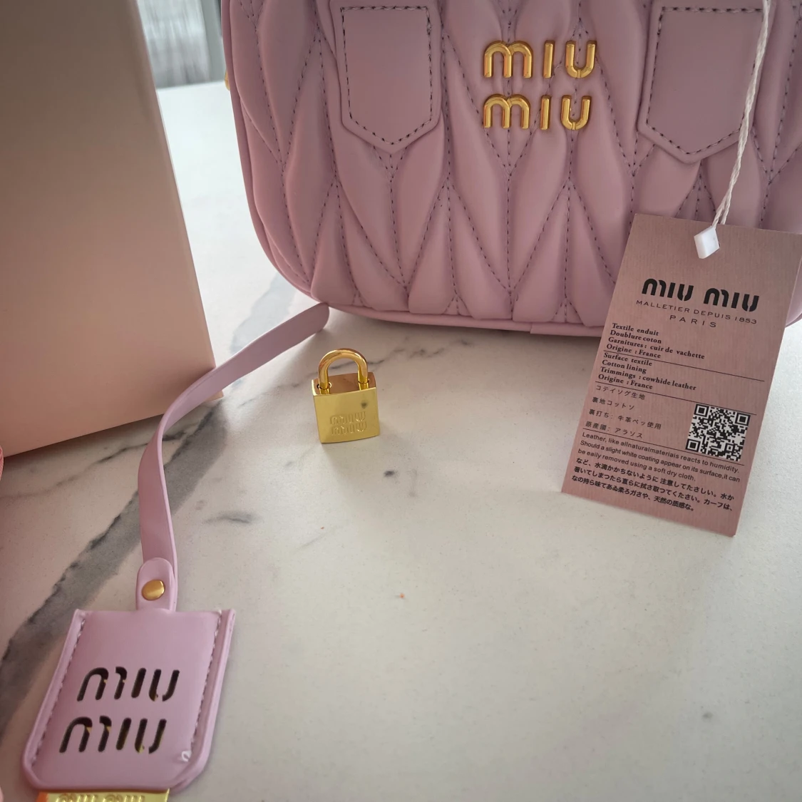 Rosa quiltad handväska från Miu Miu - 1