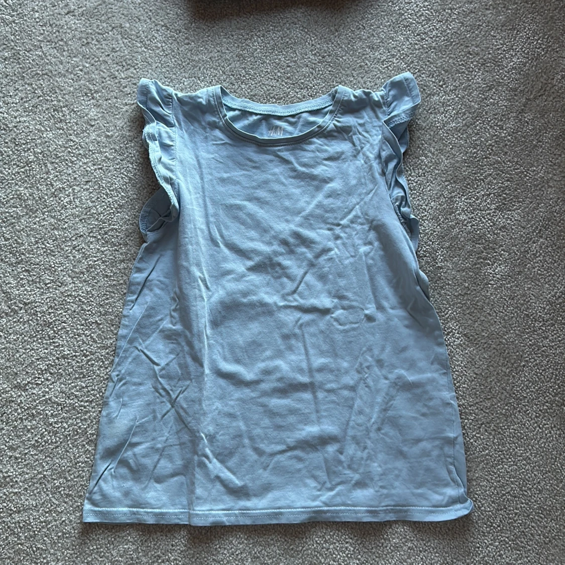 Tre toppar från H&M i olika färger - 1