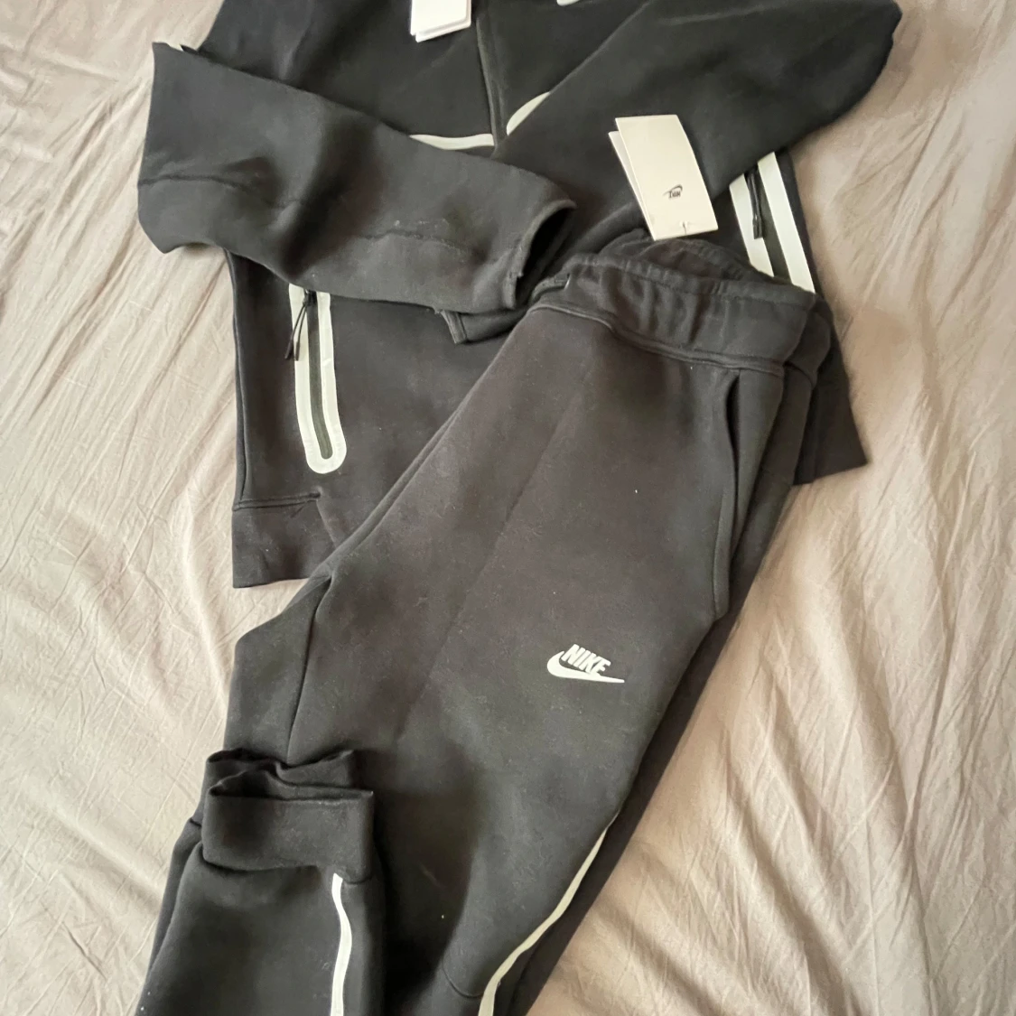 Nike tech reflective tracksuit