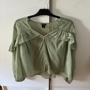 Blus - En ljus grön blus