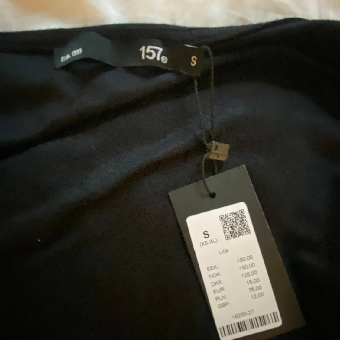 Svart omlottopp från 157 - 1