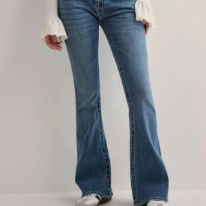 Blå bootcut jeans från True Religion - Snygga blå bootcut jeans från True religion