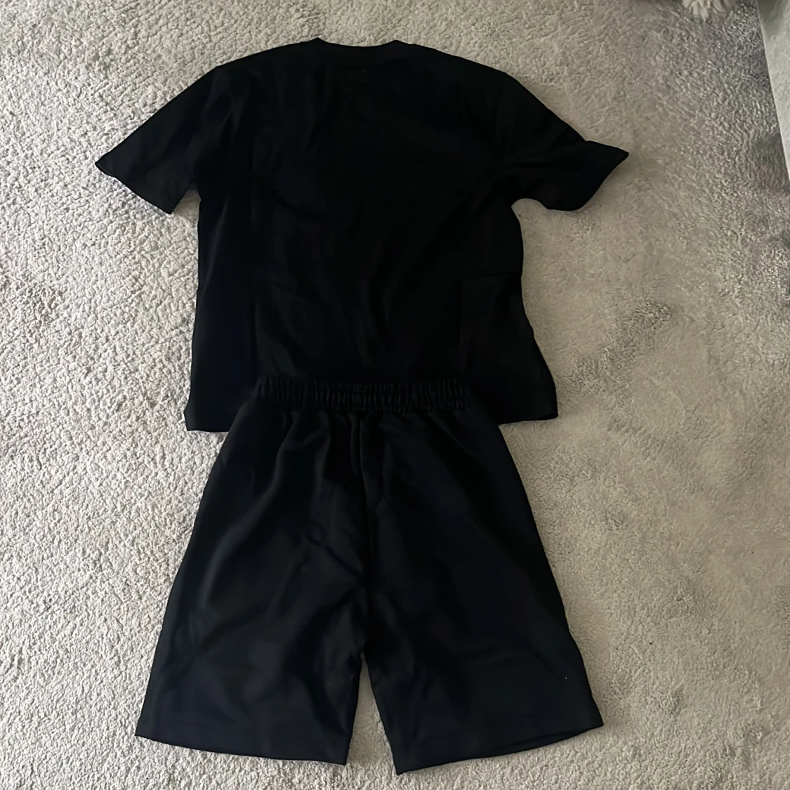 Svarta shorts från AMI Paris med hjärtdetalj - 4