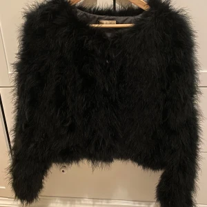 Svart fjäderjacka - Väldigt bra skick! 