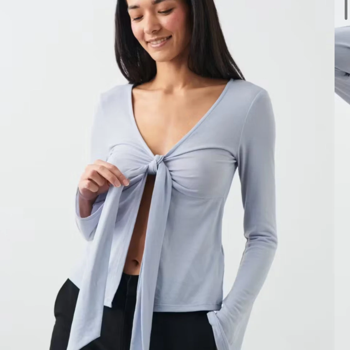 Ljusblå långärmad topp med knyt - 1