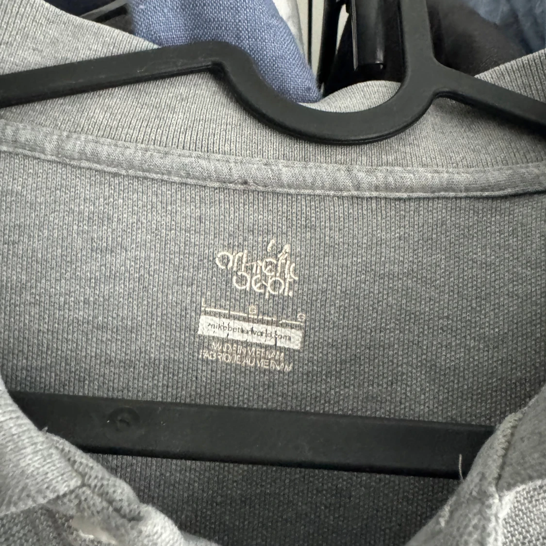 Grå pikétröja från Nike - 2