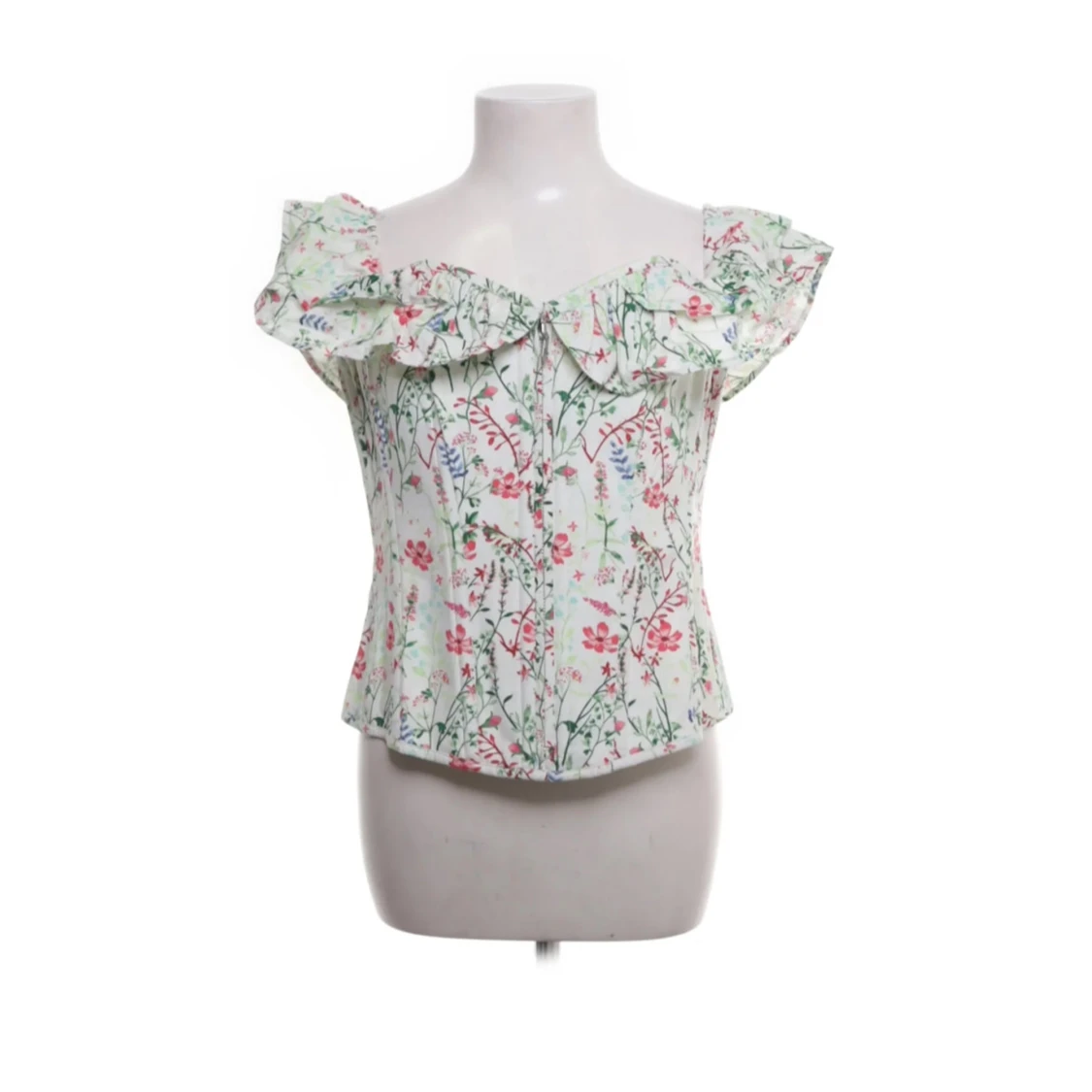 Blommig korsettopp med volang från Corset Story