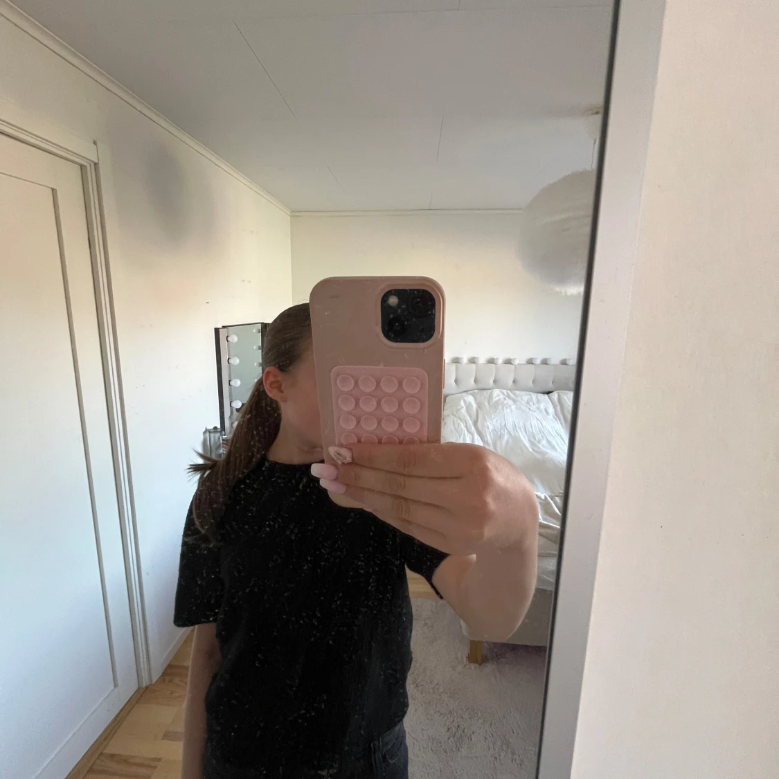 Svart stickad kortärmad tröja